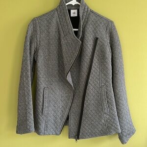 Cabi quilted herringbone pattern jacket with asymmetric zipper.